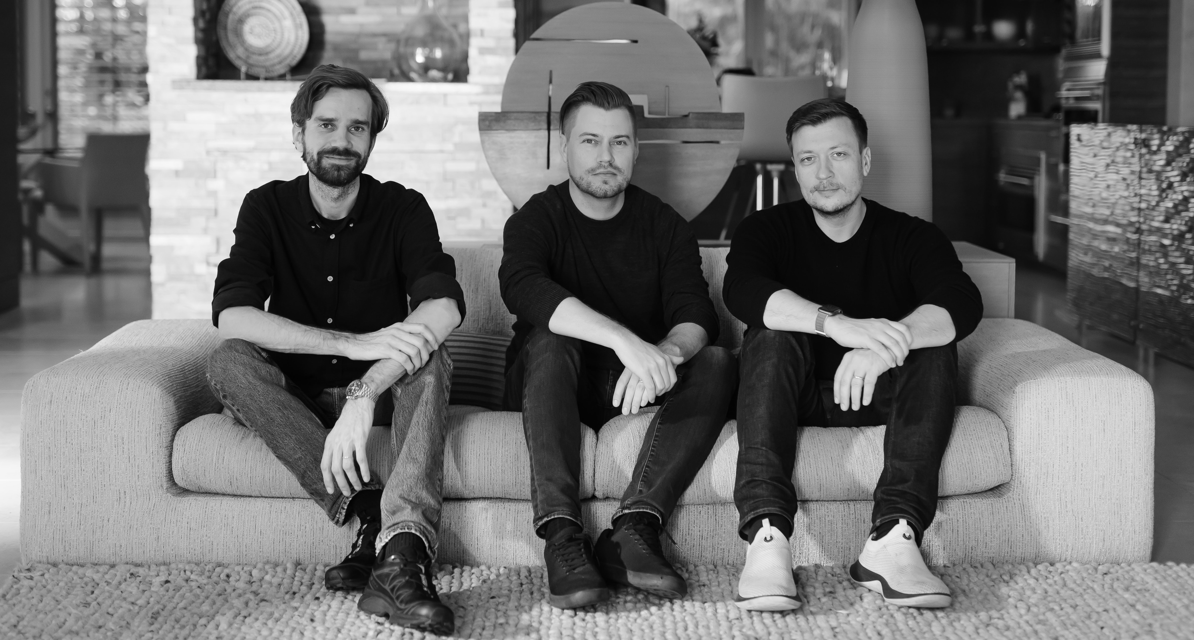 The three Linear co-cofounders (Jori Lallo, Karri Saarinen, Tuomas Artman) sitting on a couch.